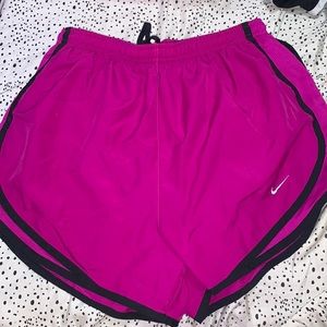 super cute orchid/fuschia (idk but a very pretty purple) nike shorts, size small